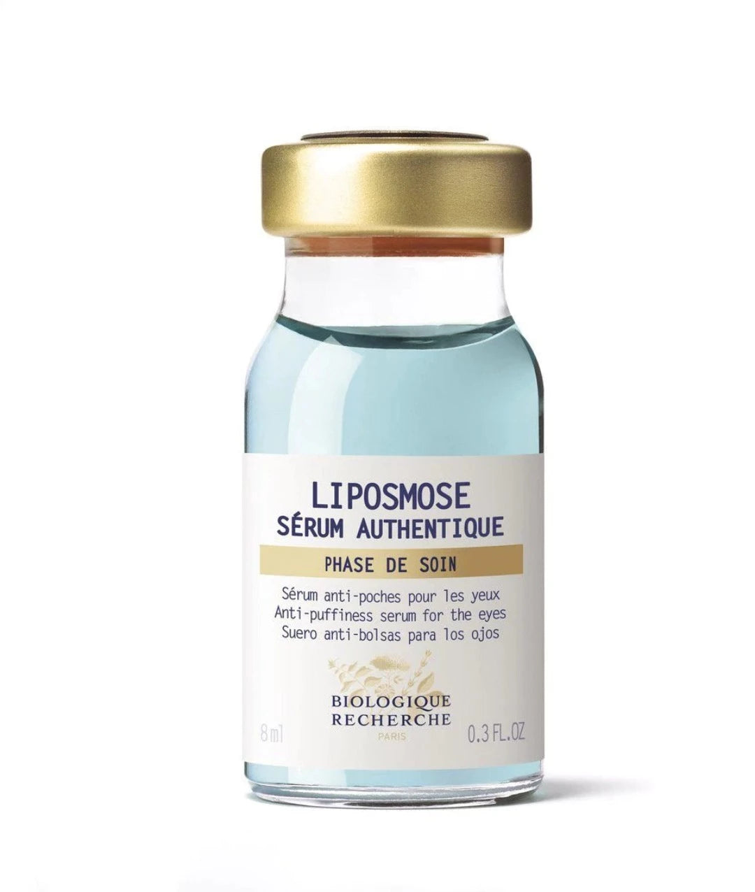 Glass vial with blue lique to depuff eyes
